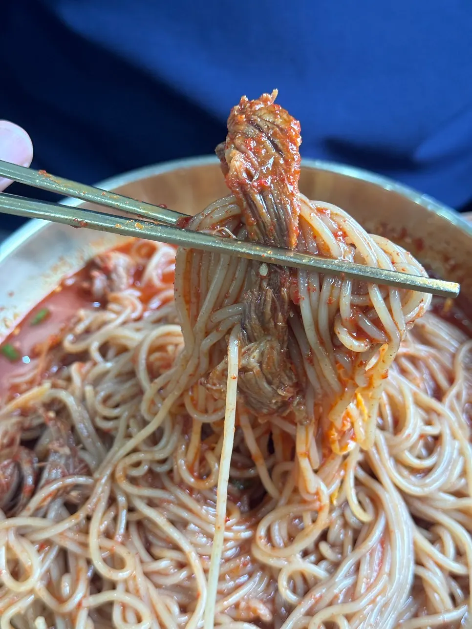 Naengmyeon and side dishes on the table at Seoul Myeonok