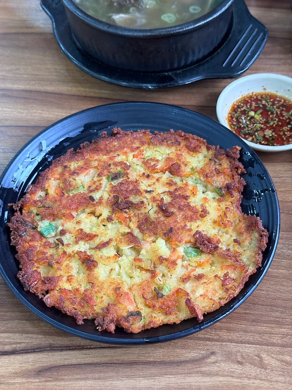 A piece of bindaetteok perfect for sharing