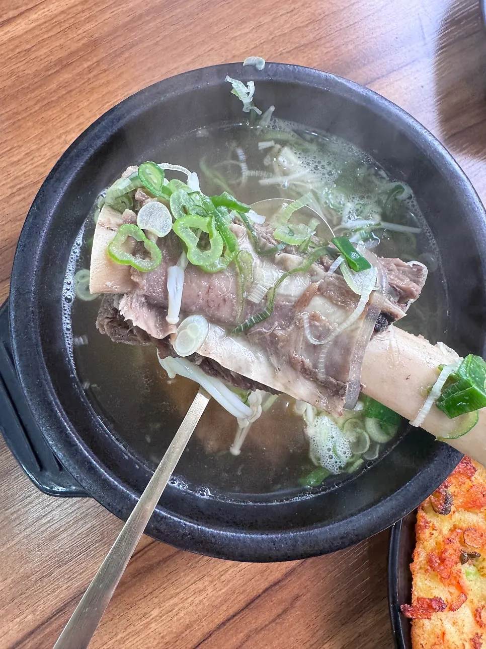 Clear galbitang broth with kkakdugi