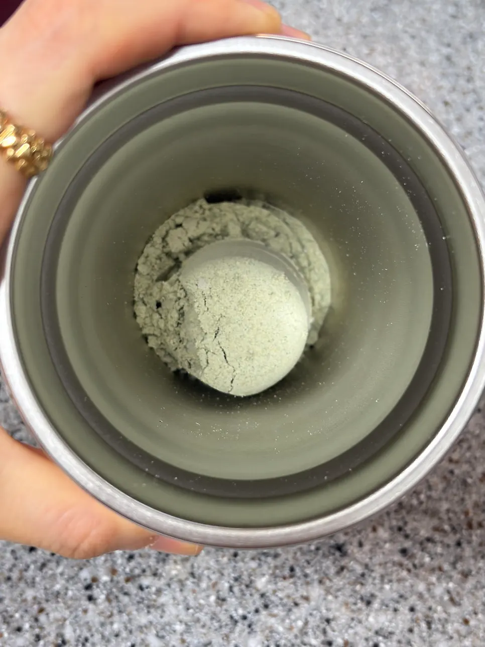 The finished color of the mugwort latte mixed with cold water