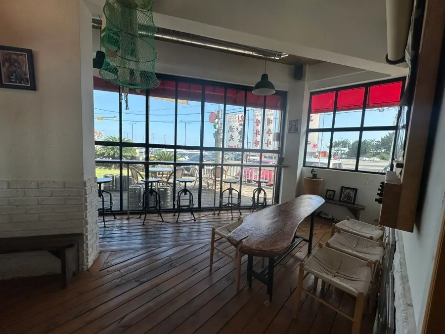 The first-floor window that looks like a piece of art