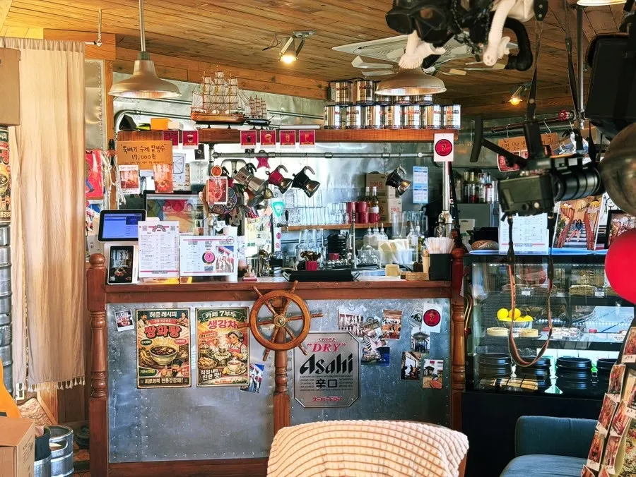Wood-toned interior of Café 7 Budu