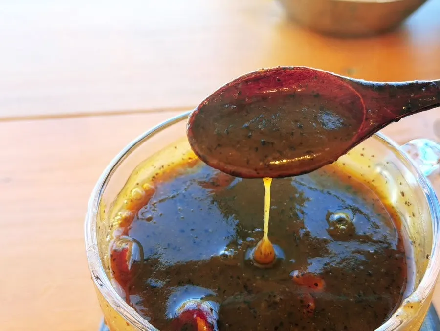 Thick-textured date tea with date garnish