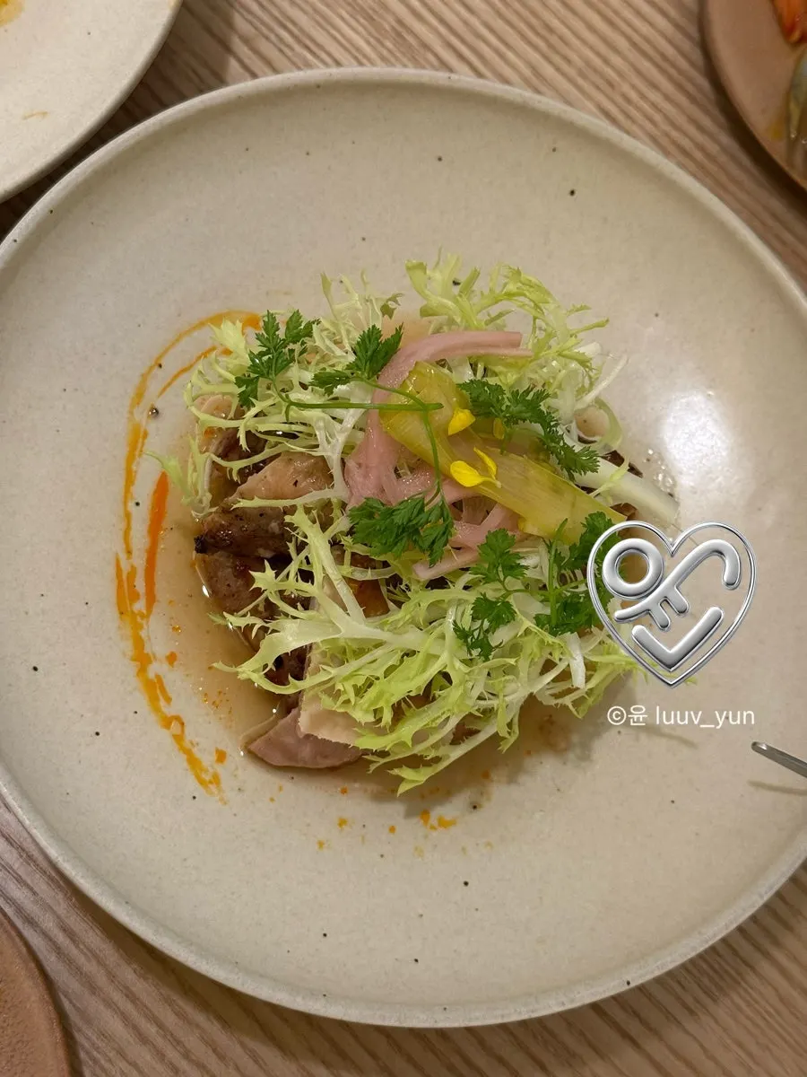 Plating of golden-grilled yuzu chicken thigh