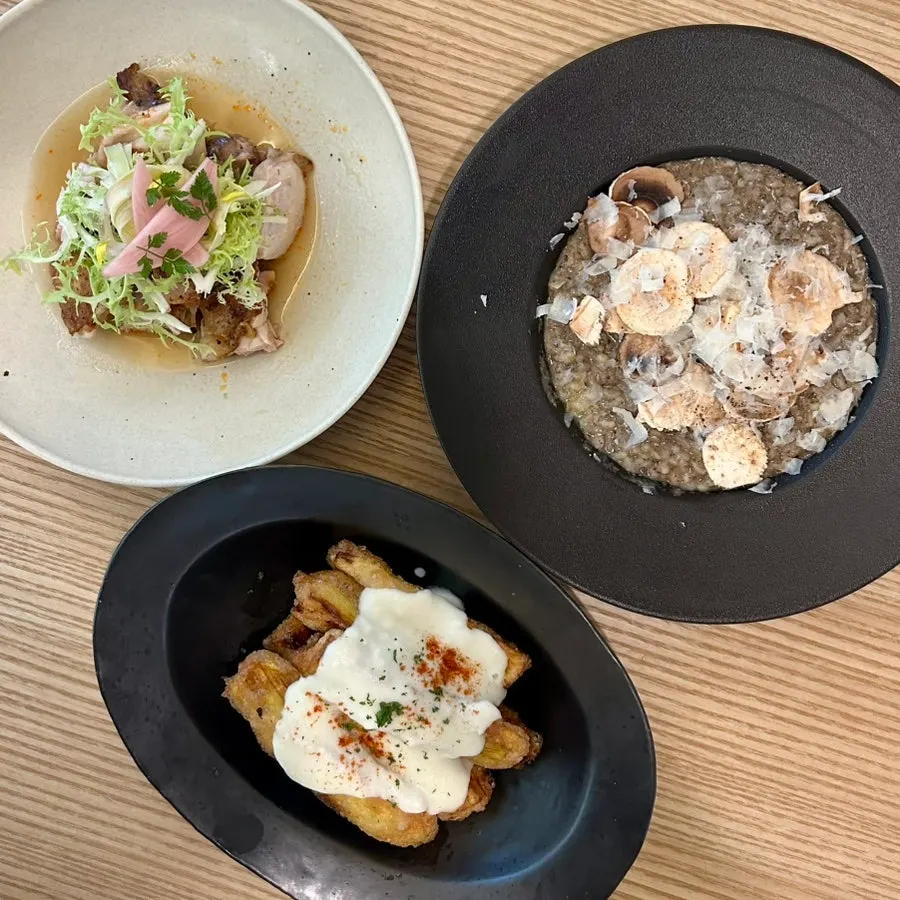 Ordered dishes set out on a two-person table