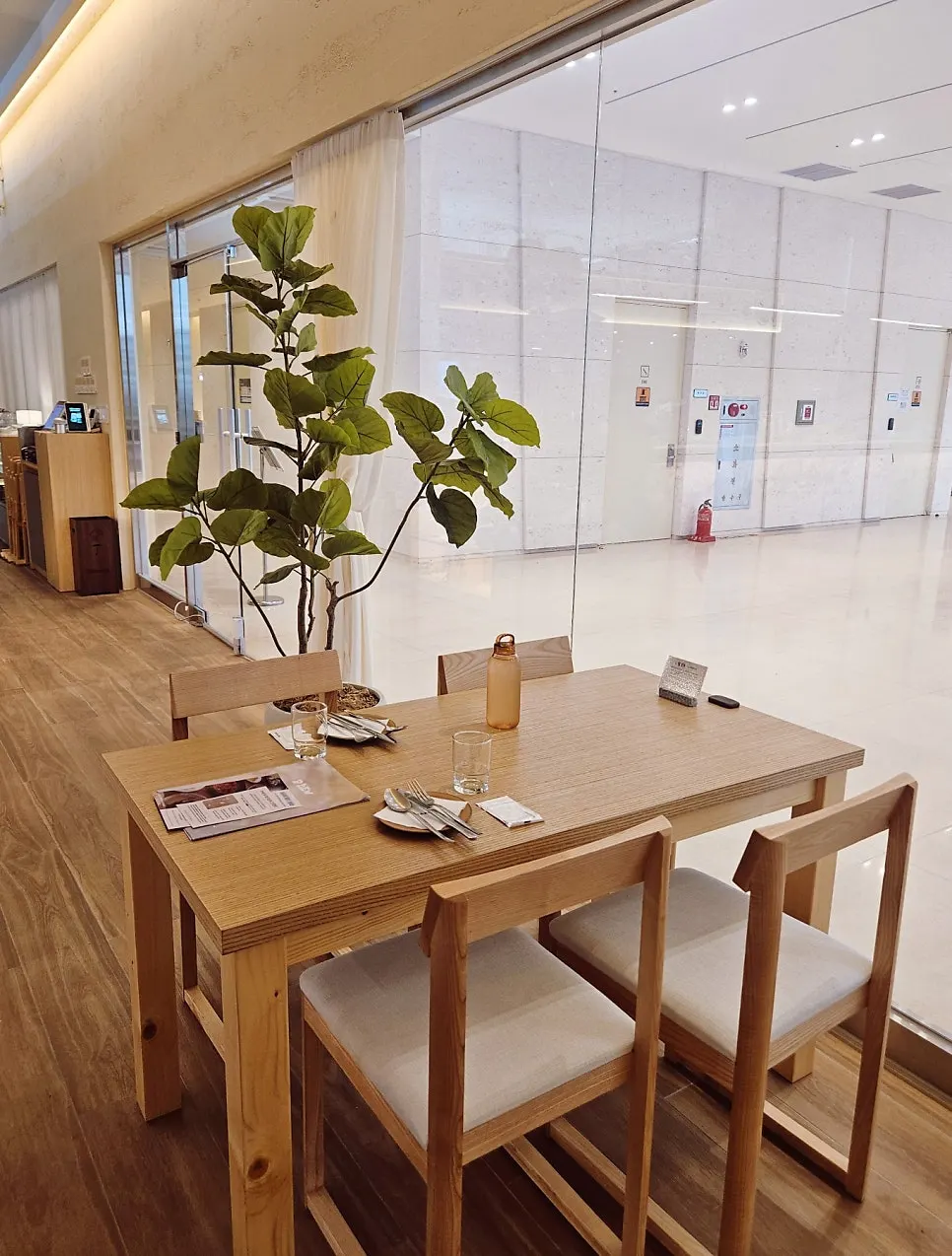 Dining hall seating and lighting at Pyu Euljiro