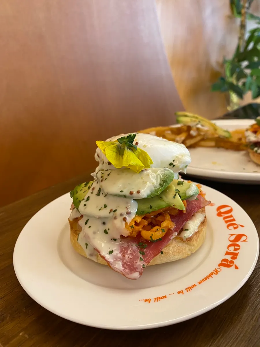 BLT open sandwich served pre-cut into two pieces