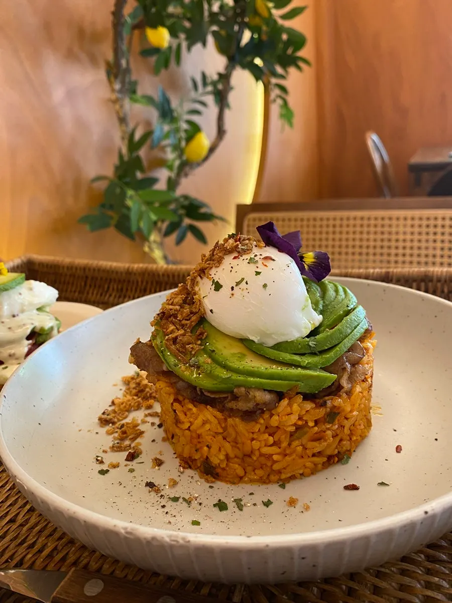 Cross-section of the open sandwich with the poached egg popped