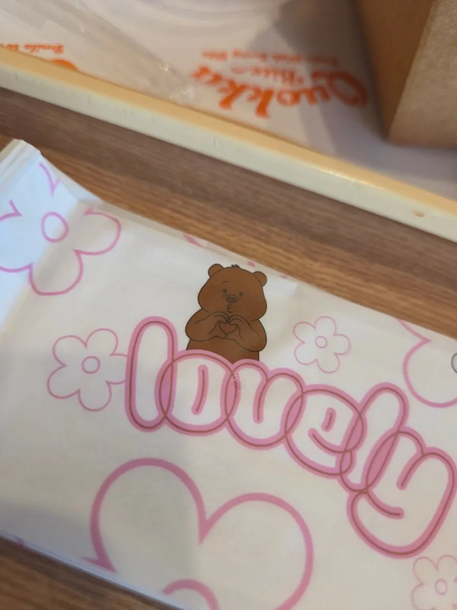 Wet wipes and burger box with quokka character design