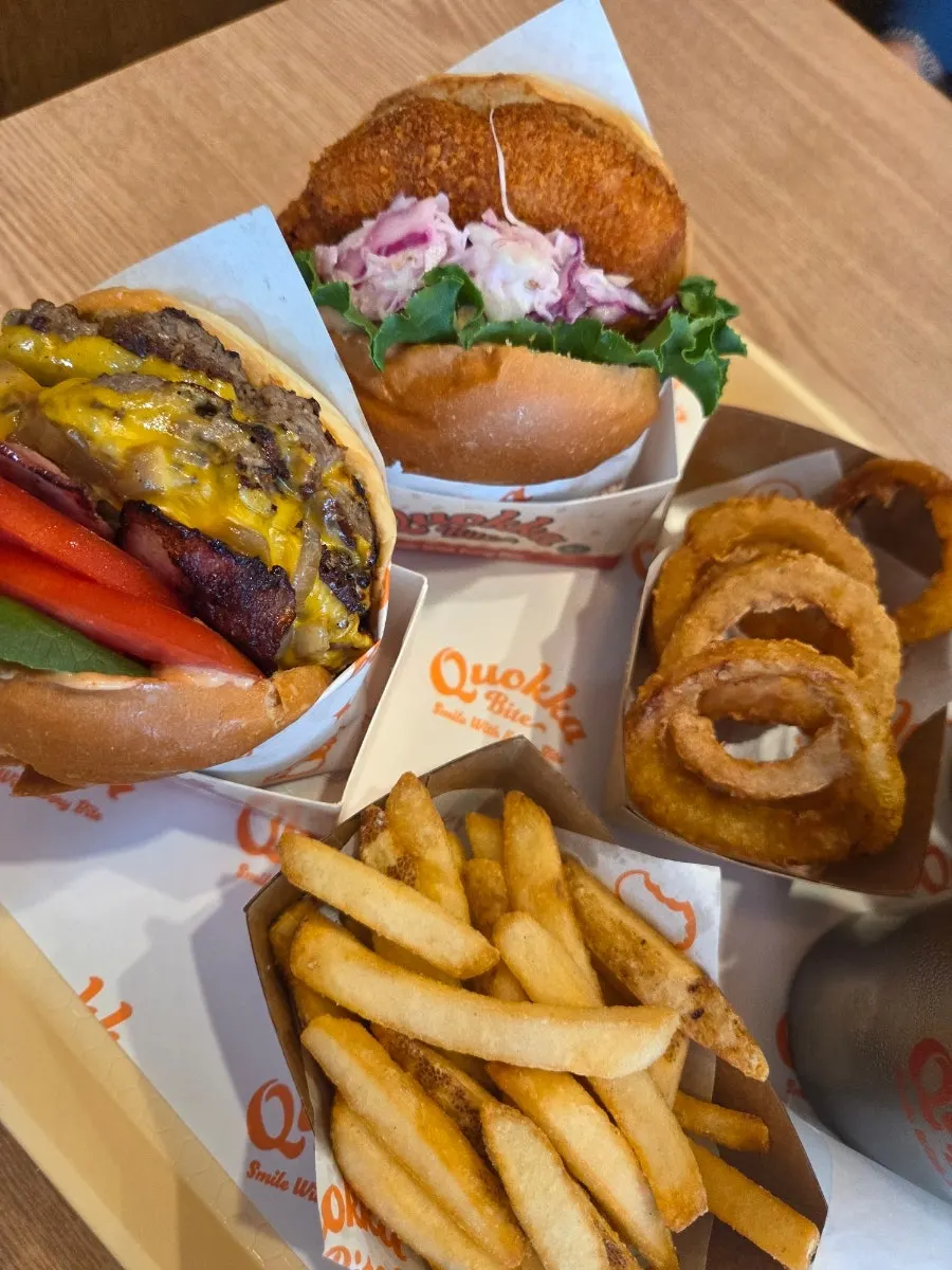 Burger cross-section showing fresh tomato and vegetables