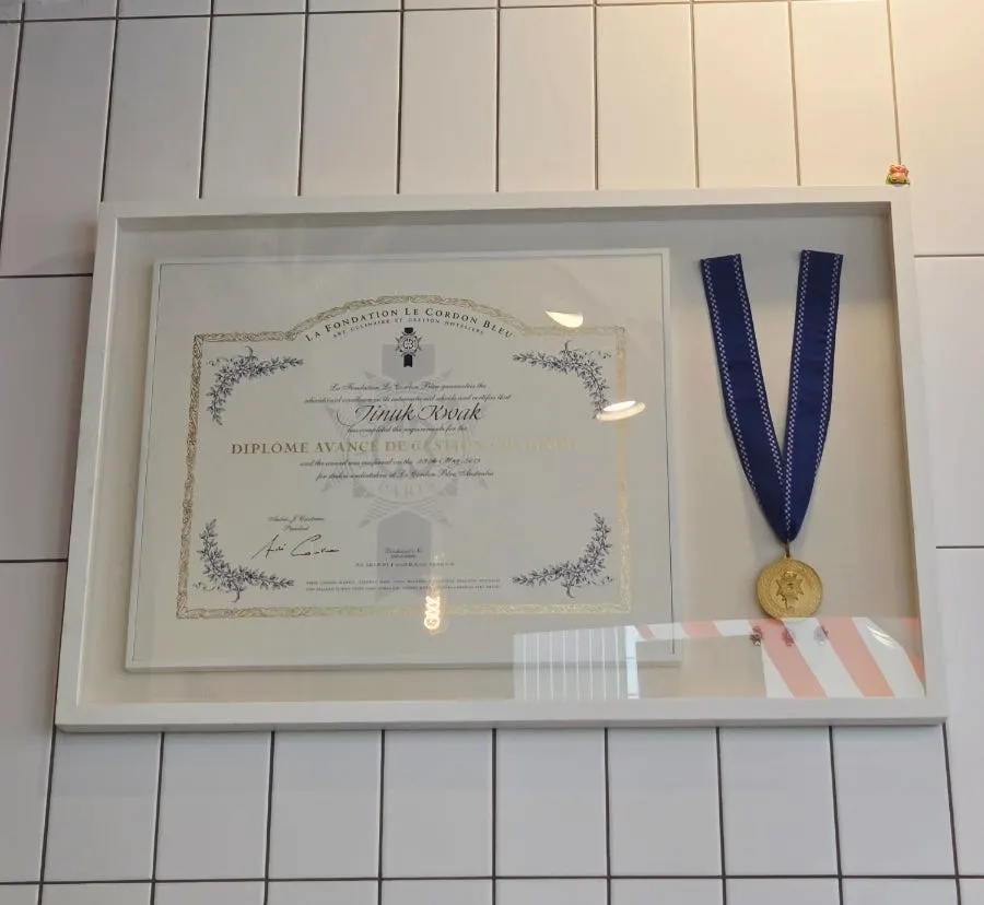 Framed award hanging on Quokka Bite's wall