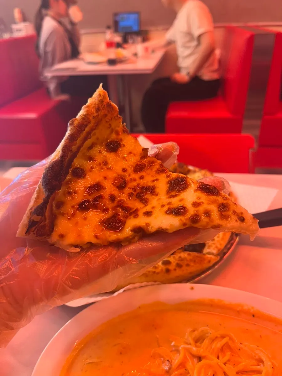 Raccoon Cheese Waterfall Pizza drizzled with condensed milk