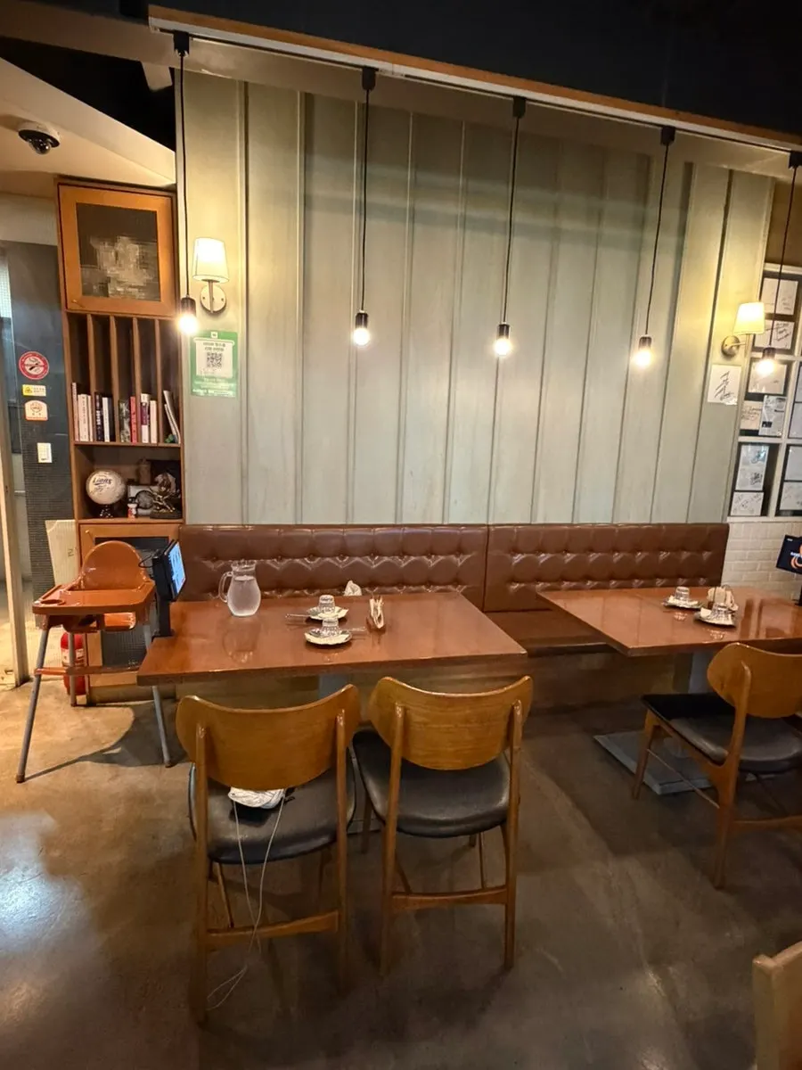 Warmly lit seating inside the restaurant