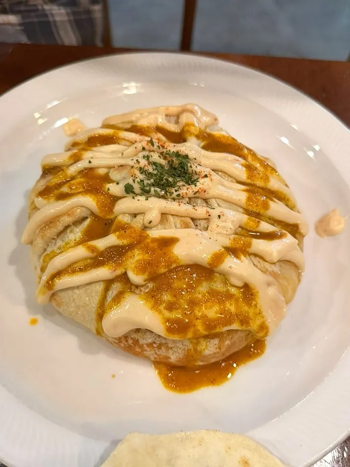 Nasi goreng topped generously with sauce