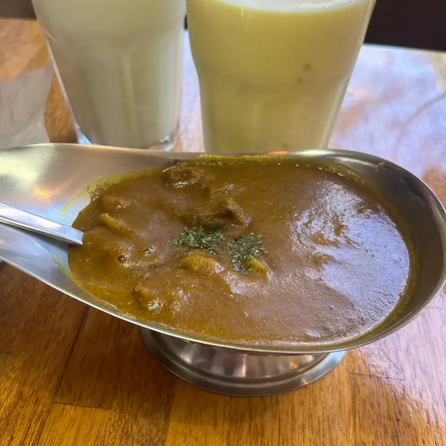 Beef curry served in a genie-lamp-shaped bowl