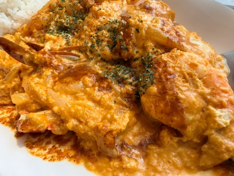Close-up of crab pieces in the phad phong curry
