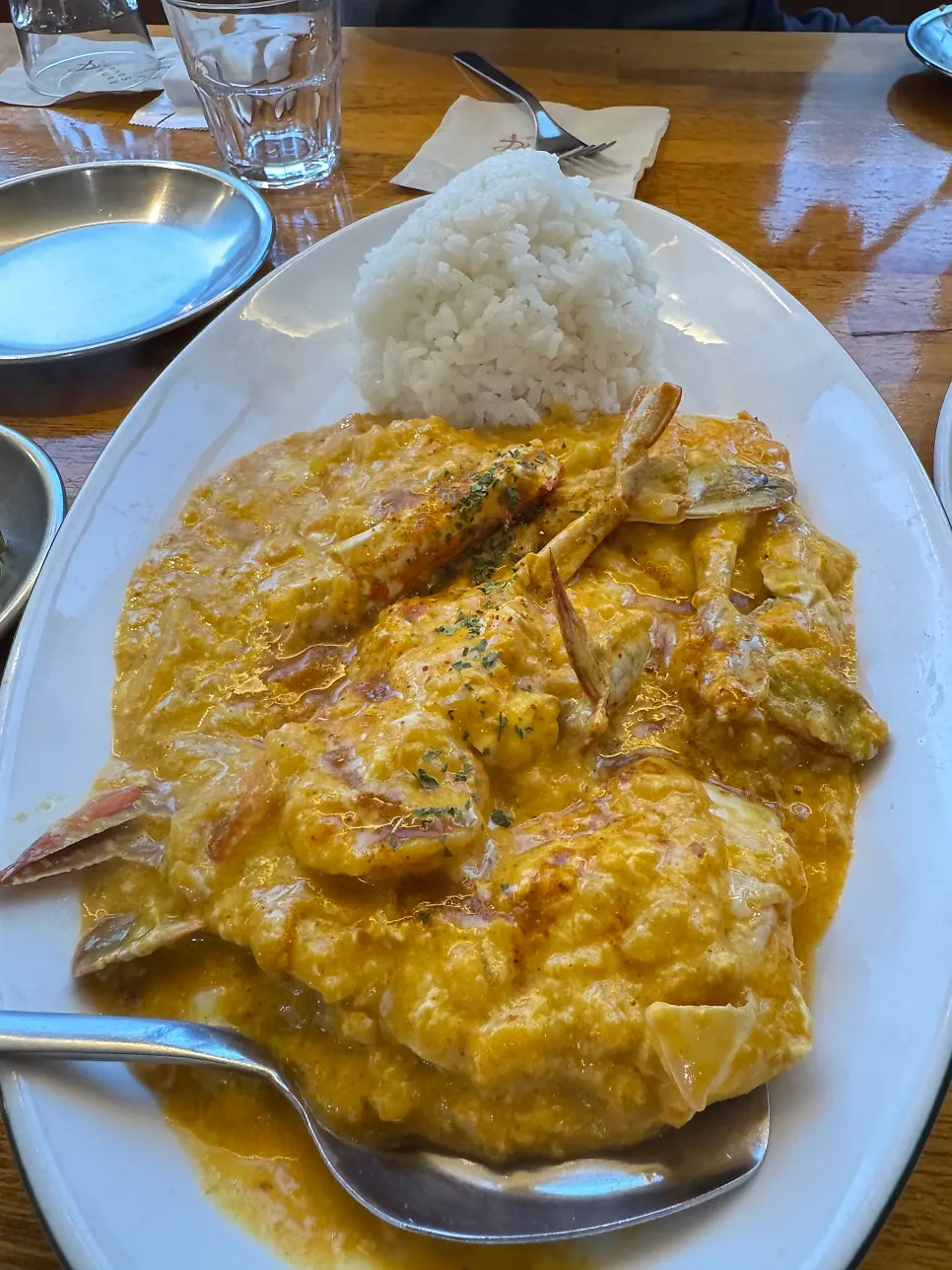 Octopus and cheese visible inside the nasi goreng