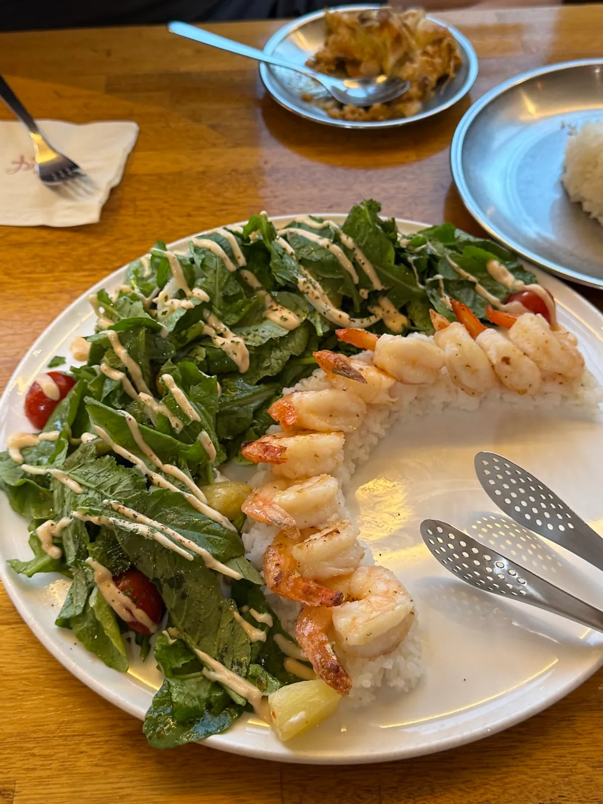 A plate of tom yum crab curry with crab