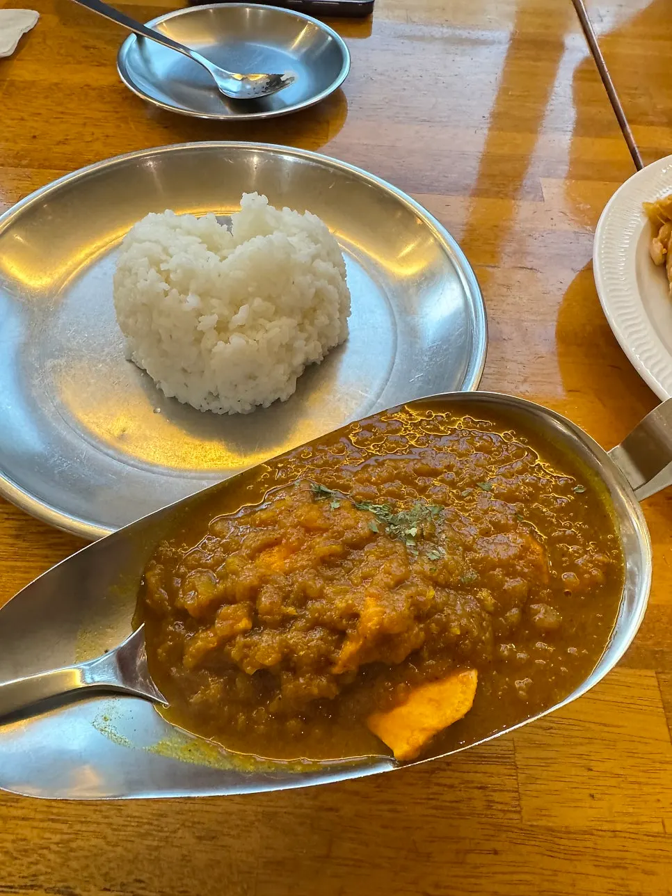 Shrimp on rice drizzled with the house sauce