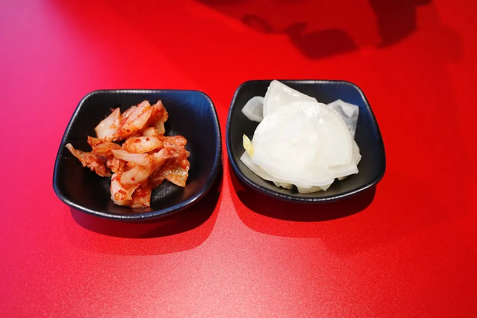 Kimchi and yuzu-scented danmuji set out on the table