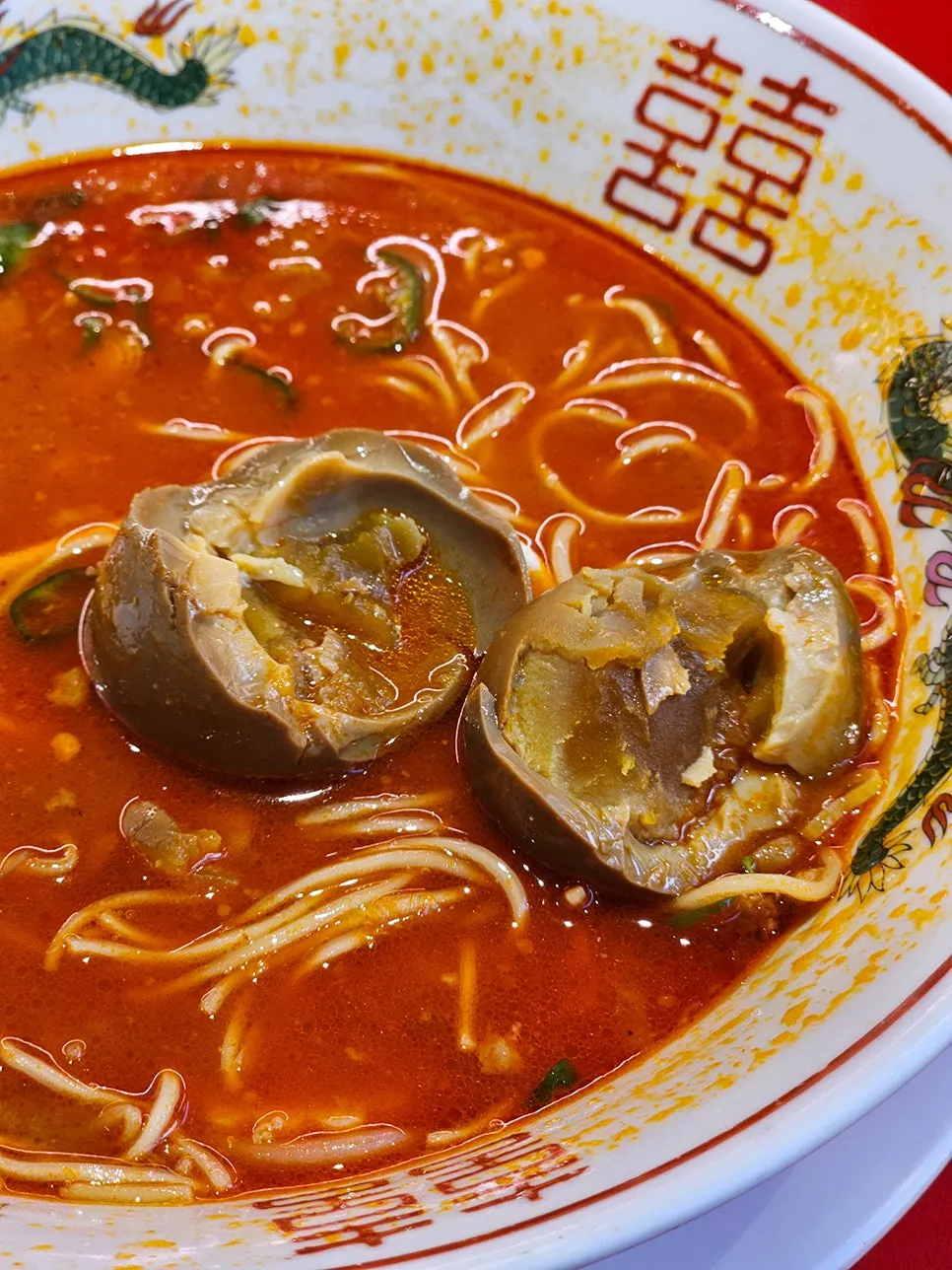 A bowl of rich ramen broth