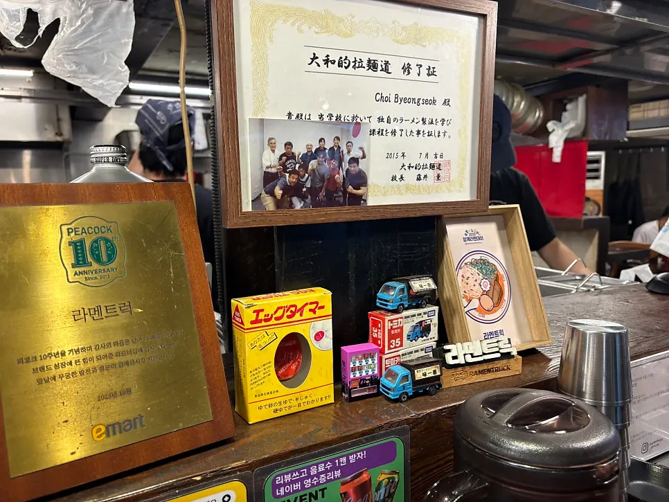 Corner of the restaurant with 10th anniversary signage
