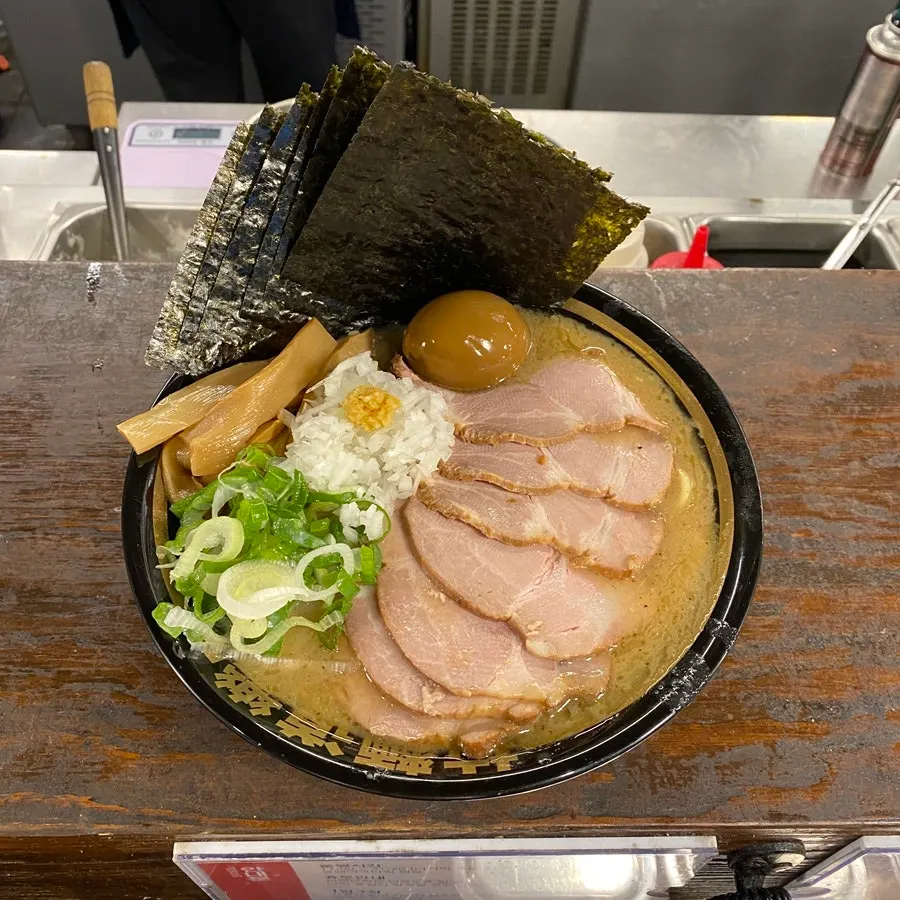 Rich broth and noodles of the Mega Ieke Ramen