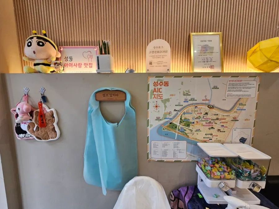 Photos of signature dishes displayed on the wall of Ranchalguksu