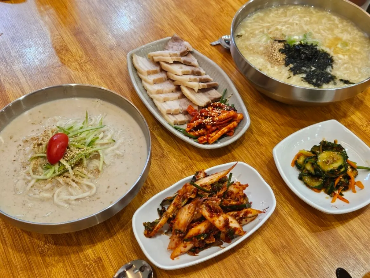 Ranchalguksu's menu board showing kalguksu and kongguksu