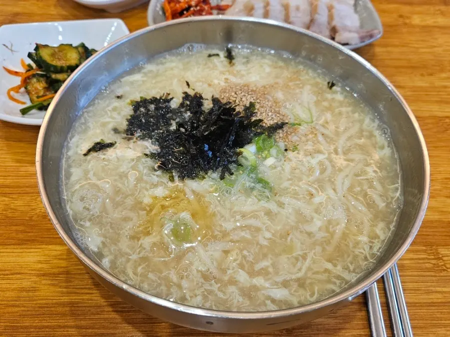 Ranchalguksu's kalguksu broth with egg stirred in