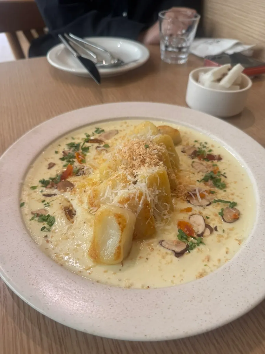 A plate of cream potato gnocchi at Raon Sik Tak Pangyo Branch