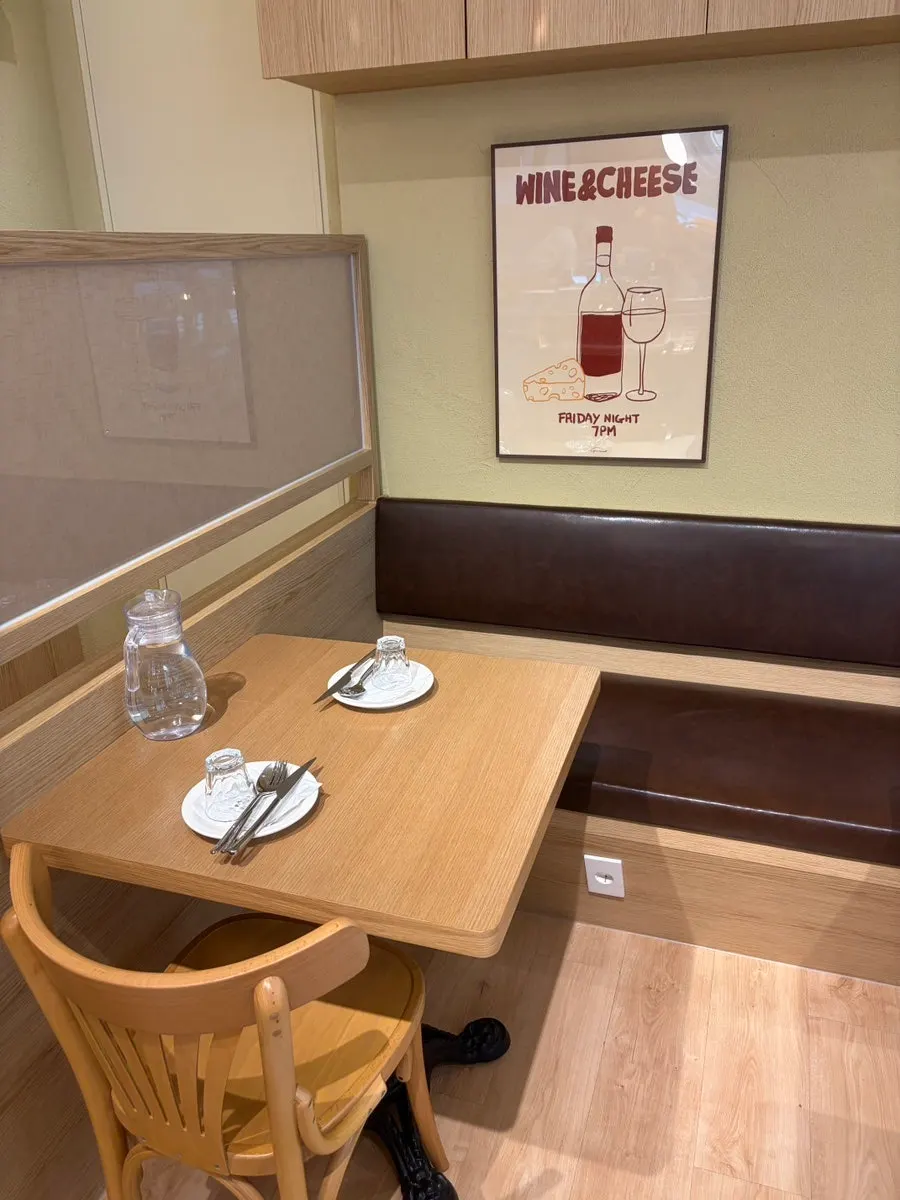 Seat taken further inside for solo dining