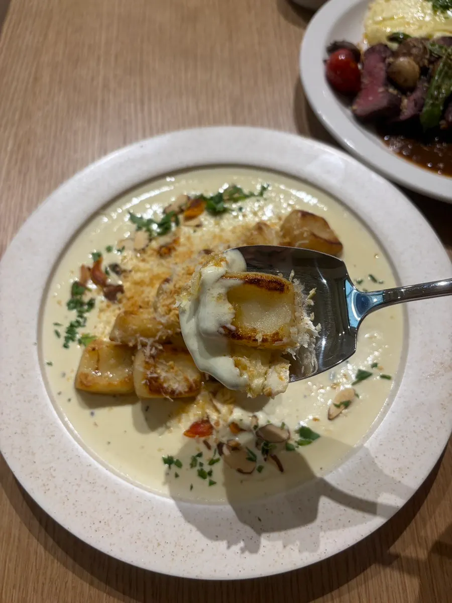 Close-up of a fluffy bite of cream potato gnocchi
