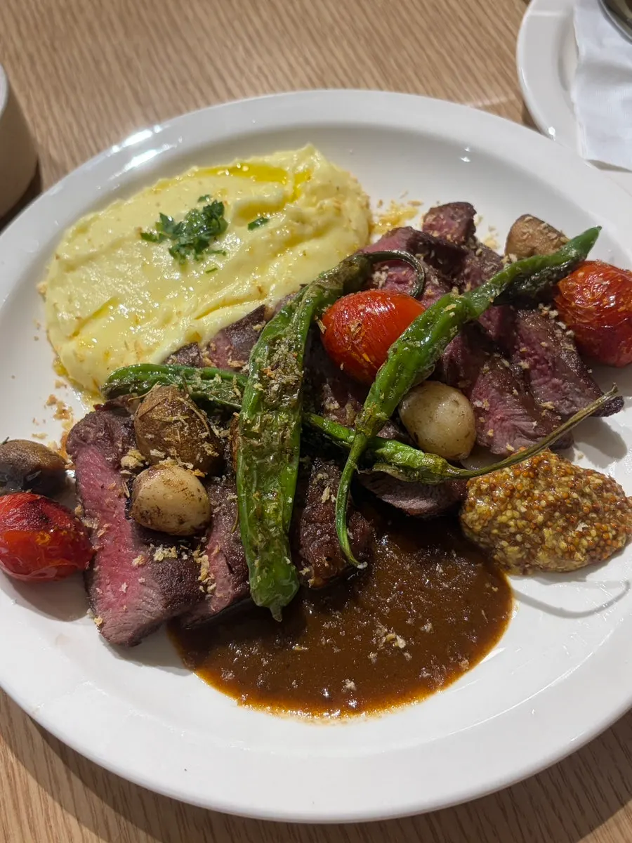 Flat iron steak served with whole grain mustard sauce