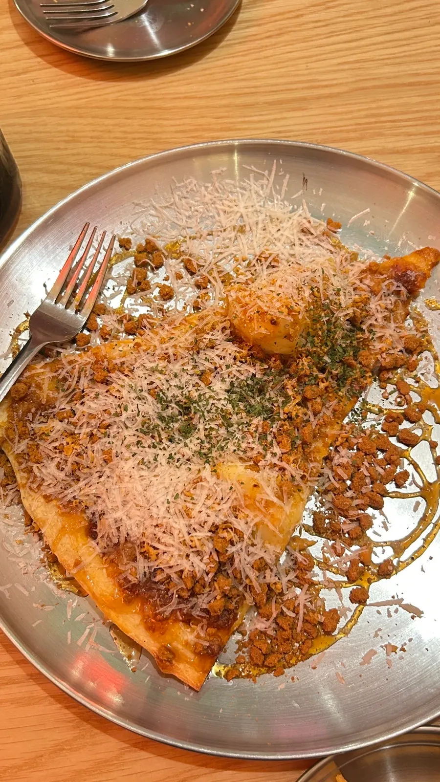 Close-up of a limited-run Brown Potato pizza slice
