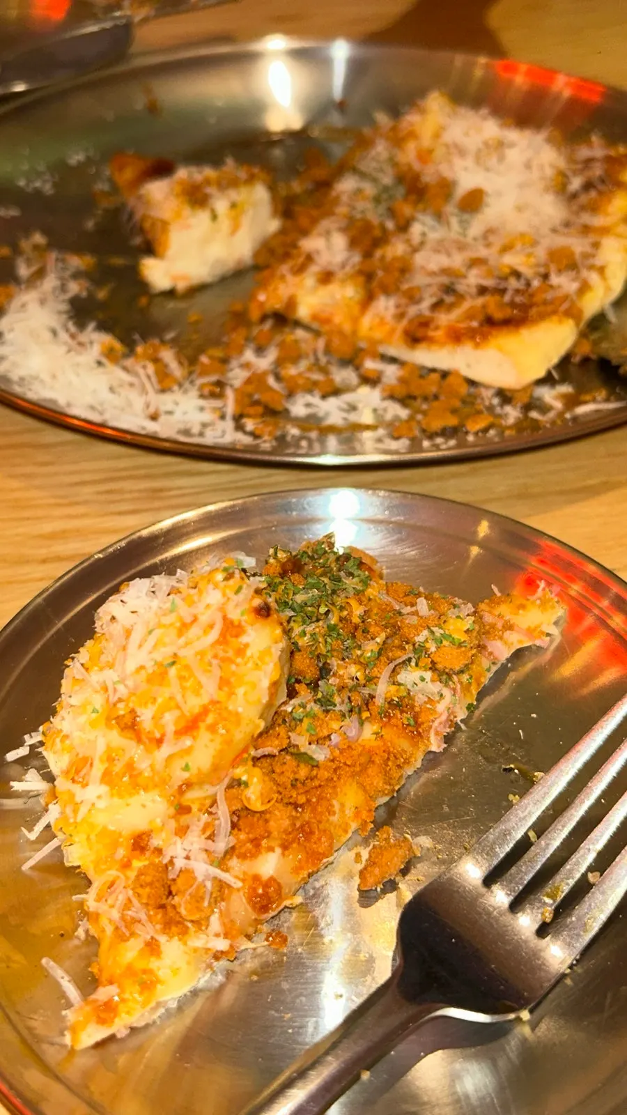 Brown Potato pizza next to a beer mug
