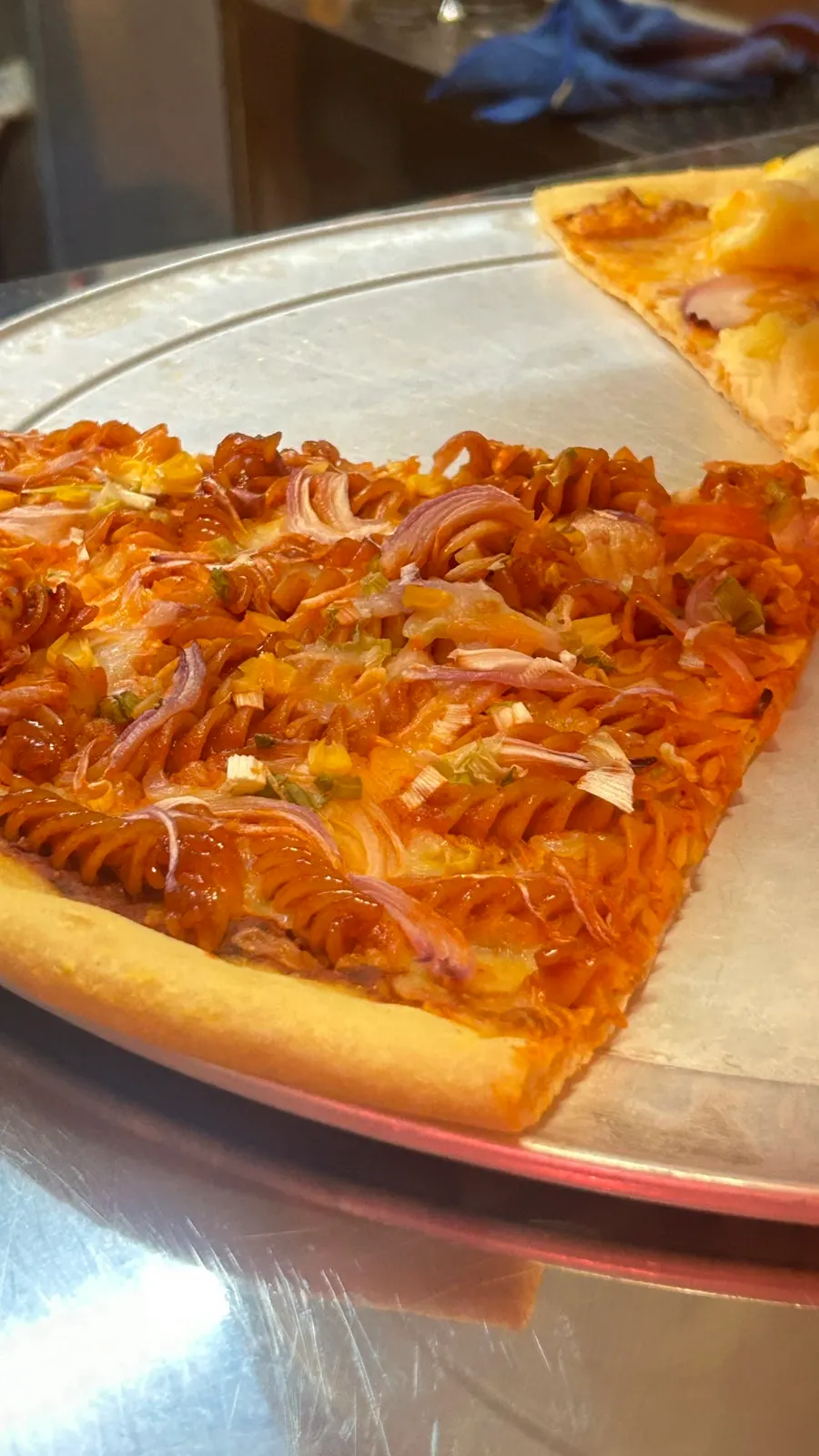 Pizzas displayed in the showcase at Raymond Isu Branch