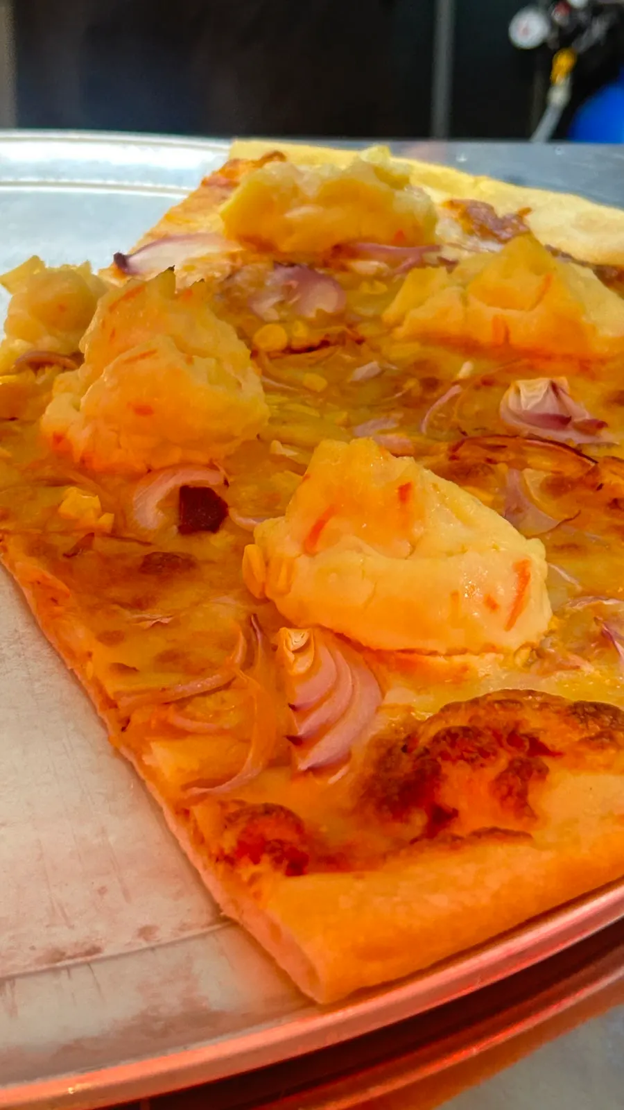 Varieties of slice pizza in the showcase