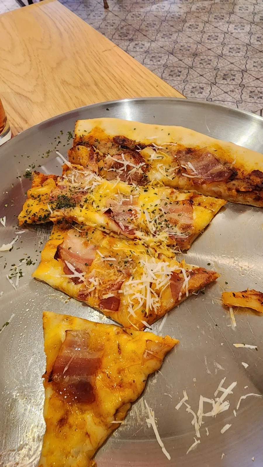 Slice of bacon Hawaiian pizza
