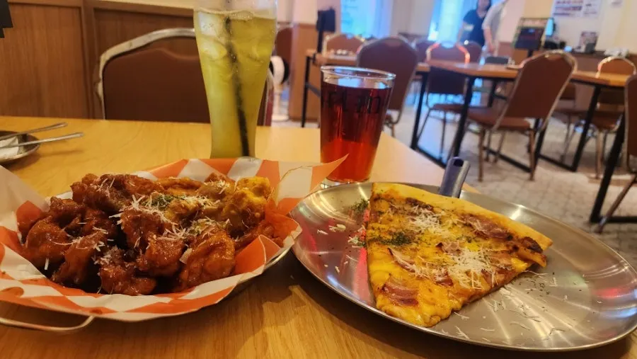 Final spread of the pizza-and-beer meal at Raymond Isu Branch