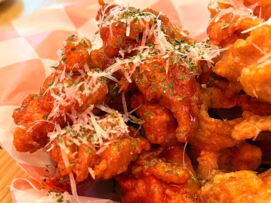 Boneless chicken coated in spicy sauce