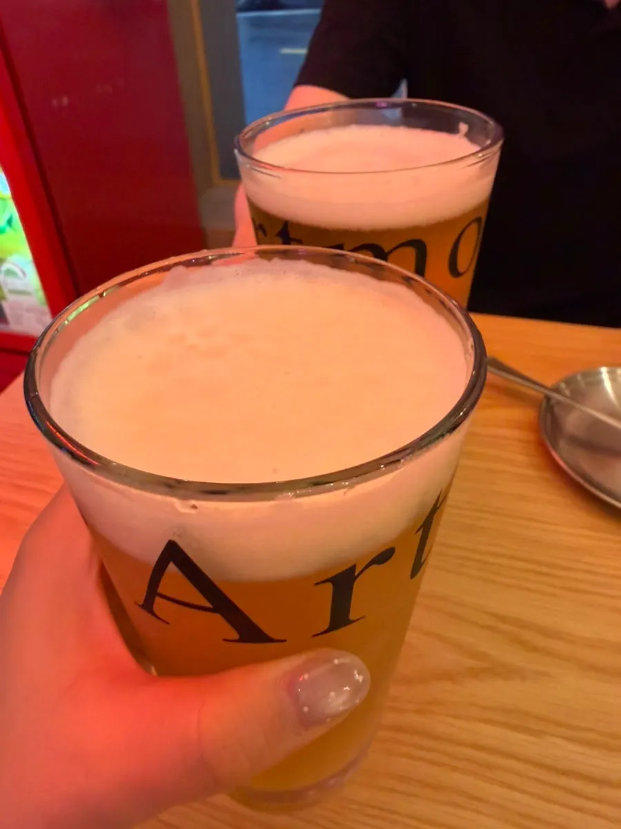 Glasses of HAZY IPA and Pilsner Lager draft beer