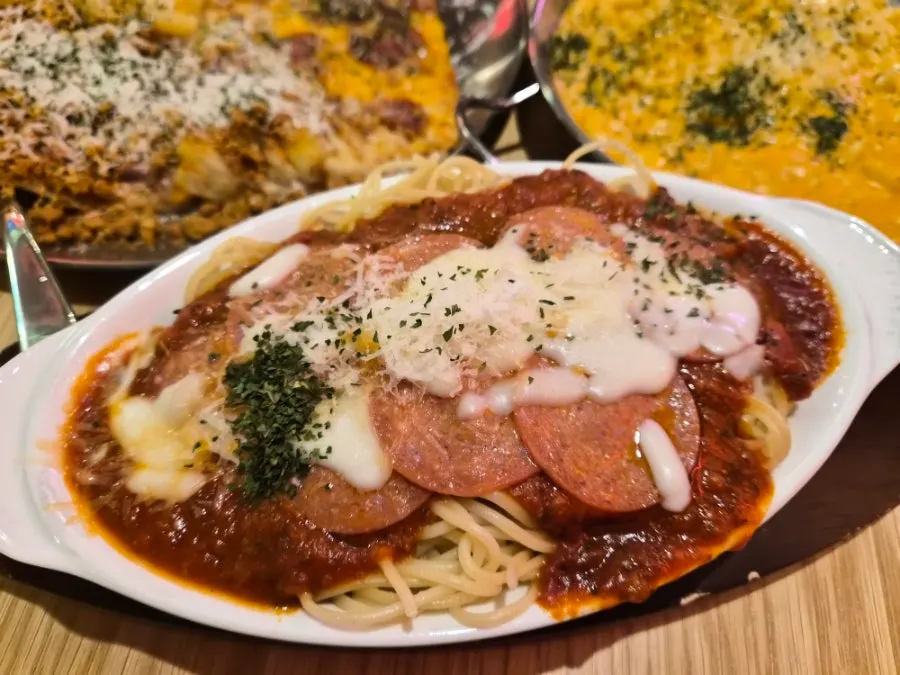 Tomato spaghetti soaked in tomato sauce