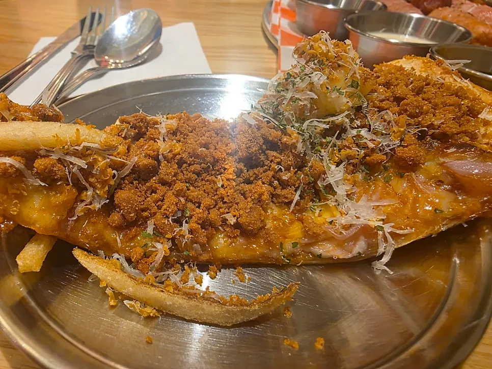 Four slices of 20-inch half-pie pizza