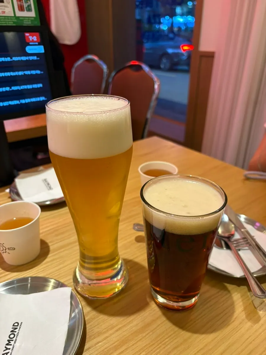 Two glasses of Vienna lager and pilsner lager draft beer