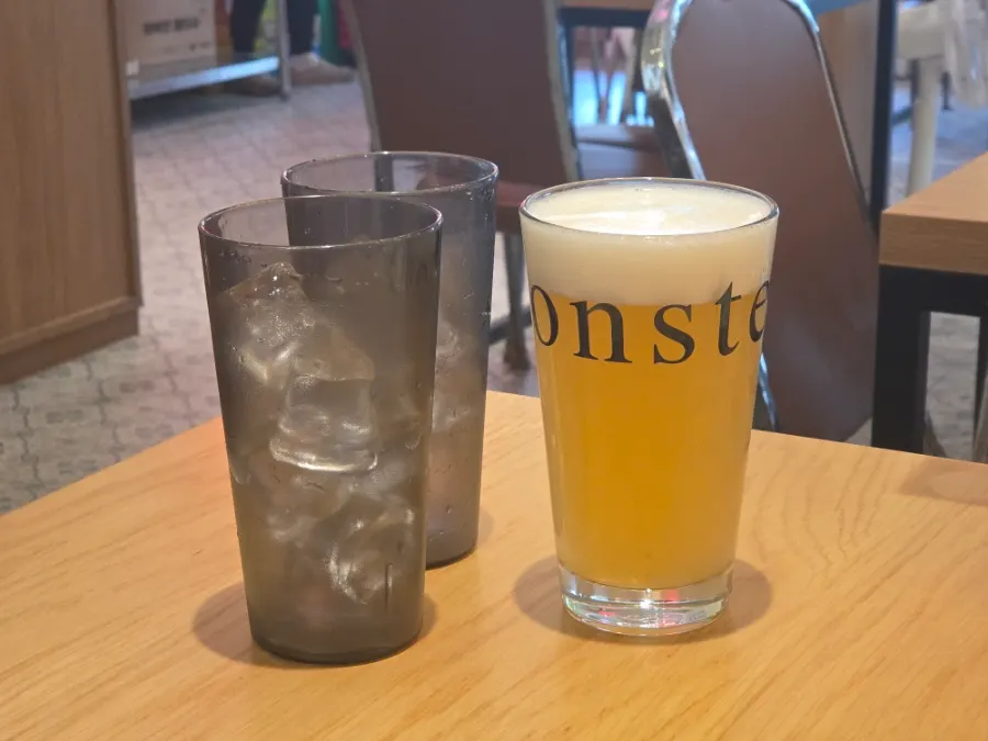 A glass of Raymond Isu Branch craft draft beer