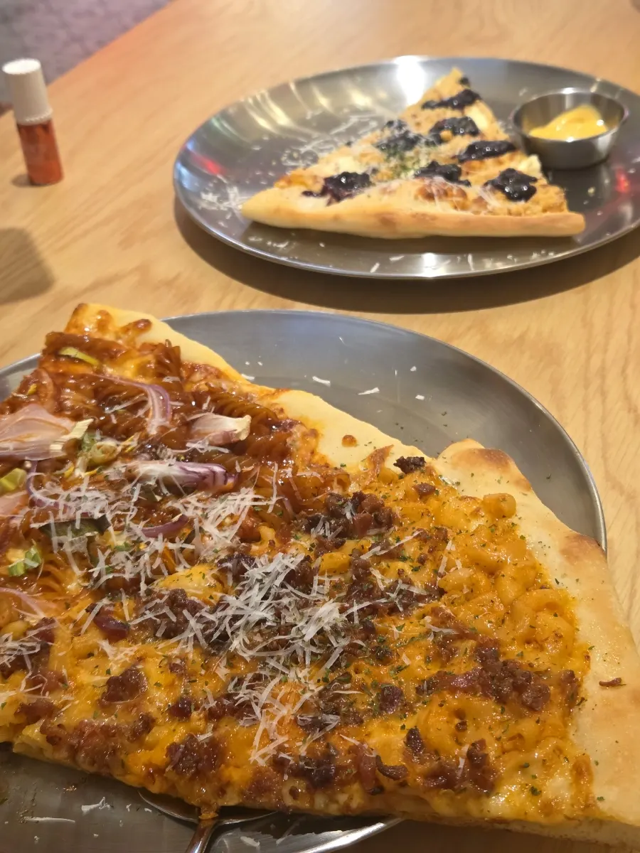 Blueberry pizza dipped in sauce