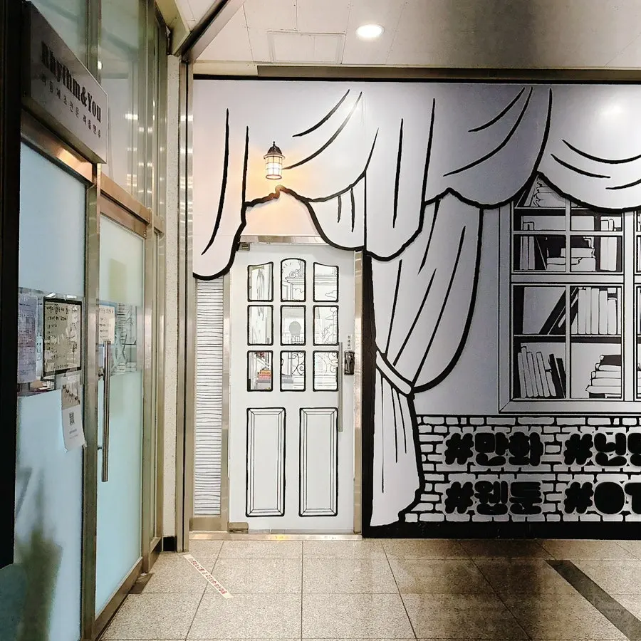 Shoe locker to the right of the Real Toon Comic Café entrance