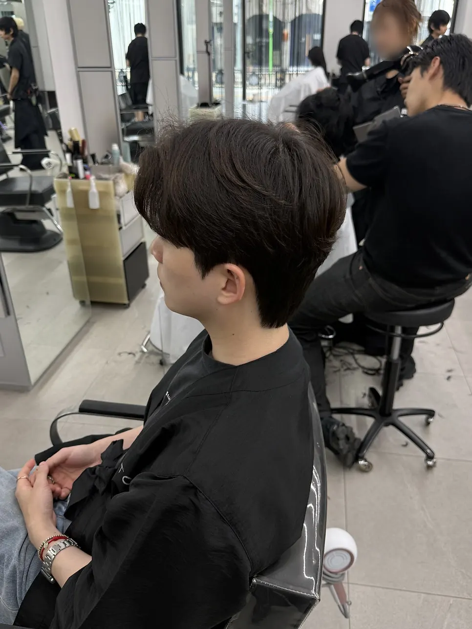 Natural back view after reworking the style by hand