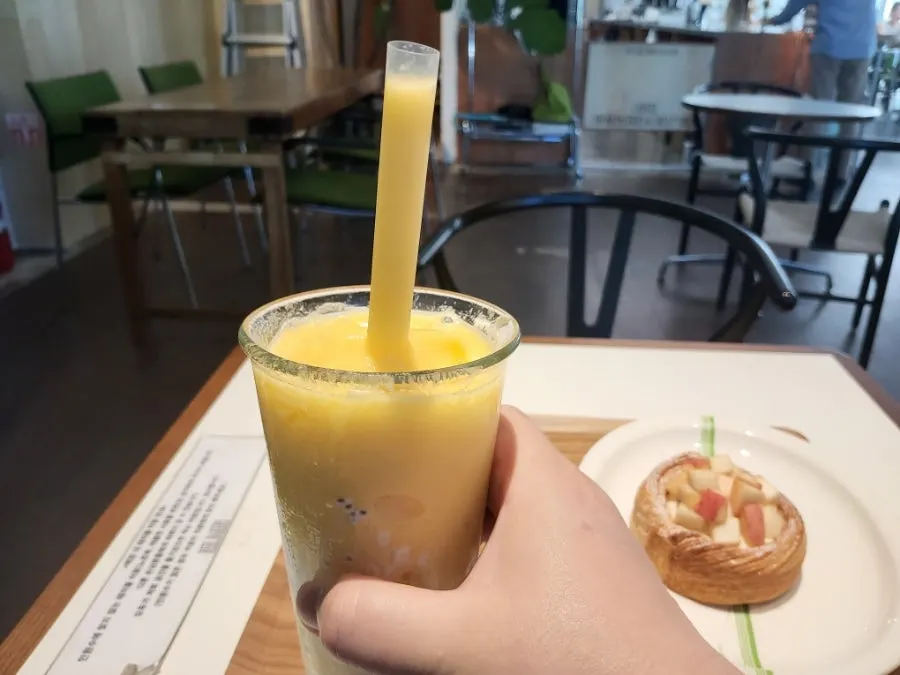 Mango smoothie paired with a pastry dessert
